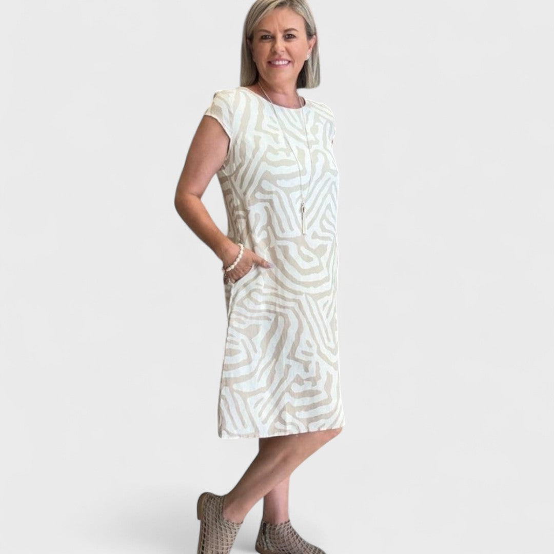 Nelia - Letnia sukienka z okrągłym dekoltem i pięknym wzorem